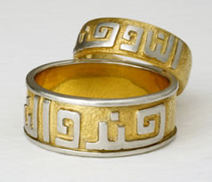 Two special wedding bands with Kufic text